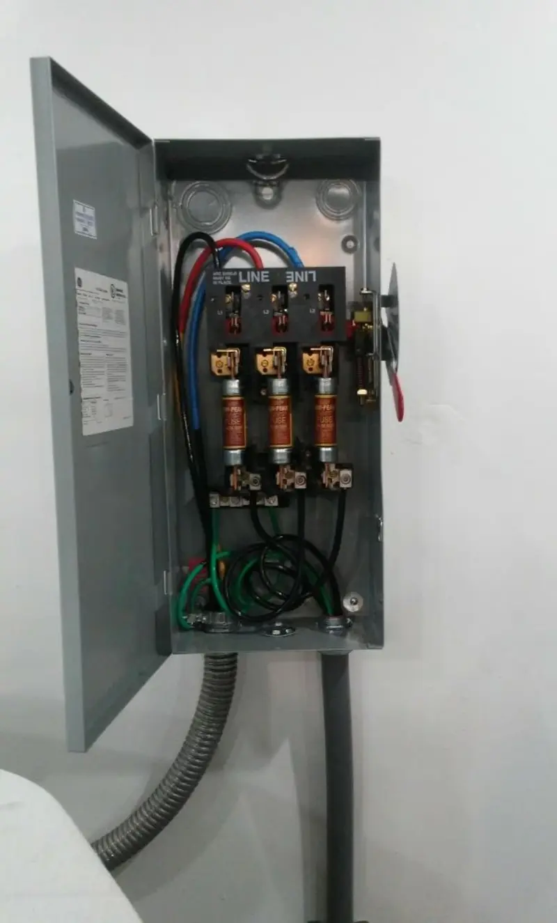 Three-phase disconnect switch installed for Smoke Detector Installation in Gleed
